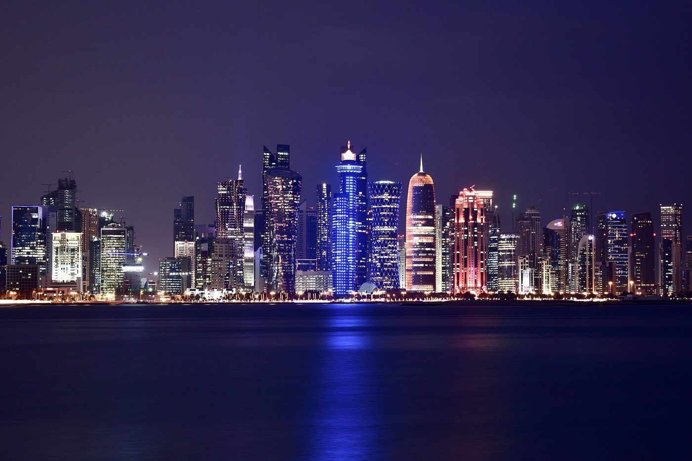 The West Bay towers at night, in Doha