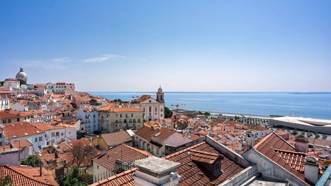 The rooftops of Alfama and the Tagus, in Lisbon